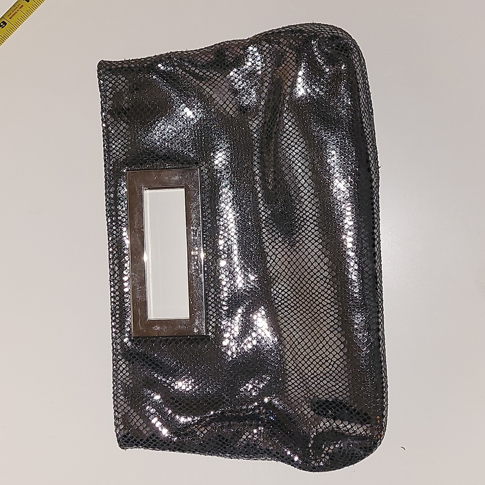 Michael Kors silver party clutch, magnetic closure